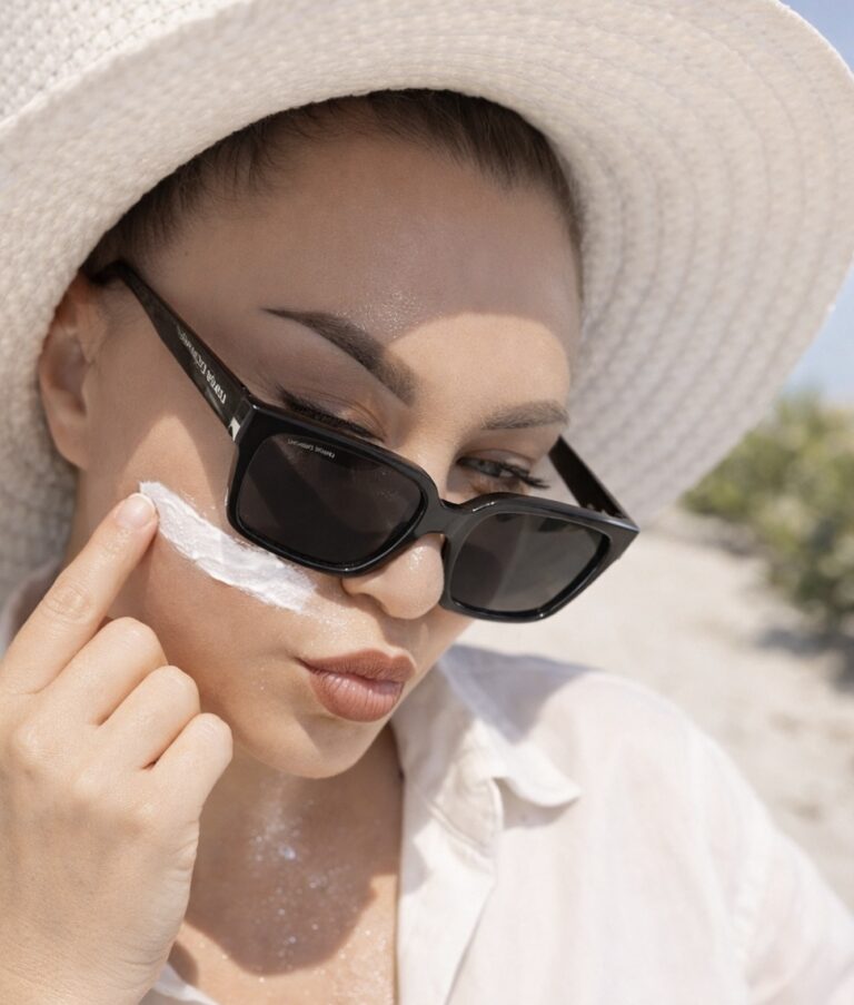 applying sunscreen on face daily skincare routine